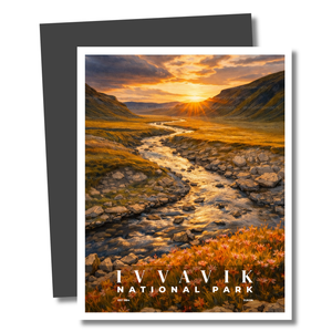 Magnet of Ivvavik National Park with a sunset over a stream and mountains.