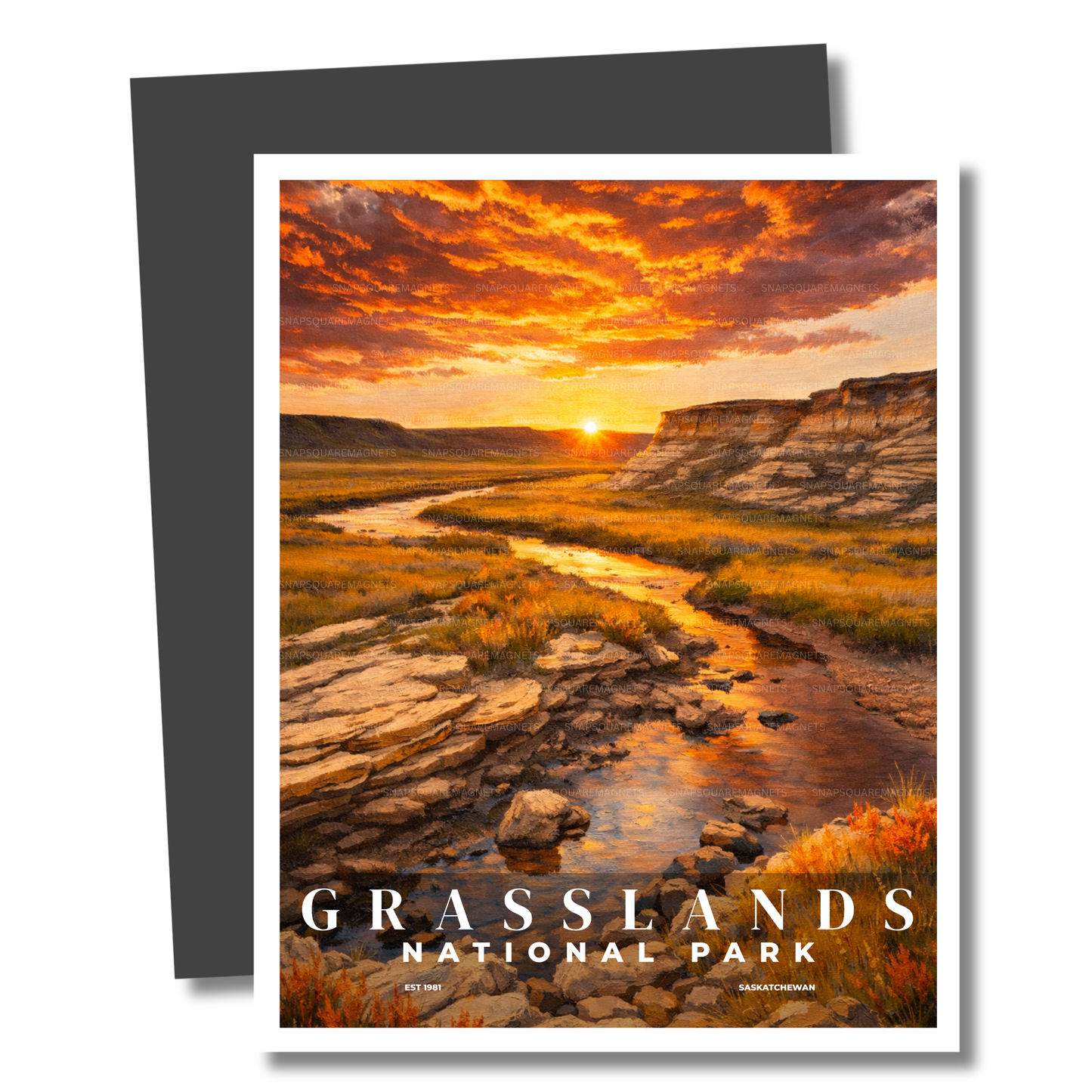 Magnet of Grasslands National Park with a sunset over a stream and hills.