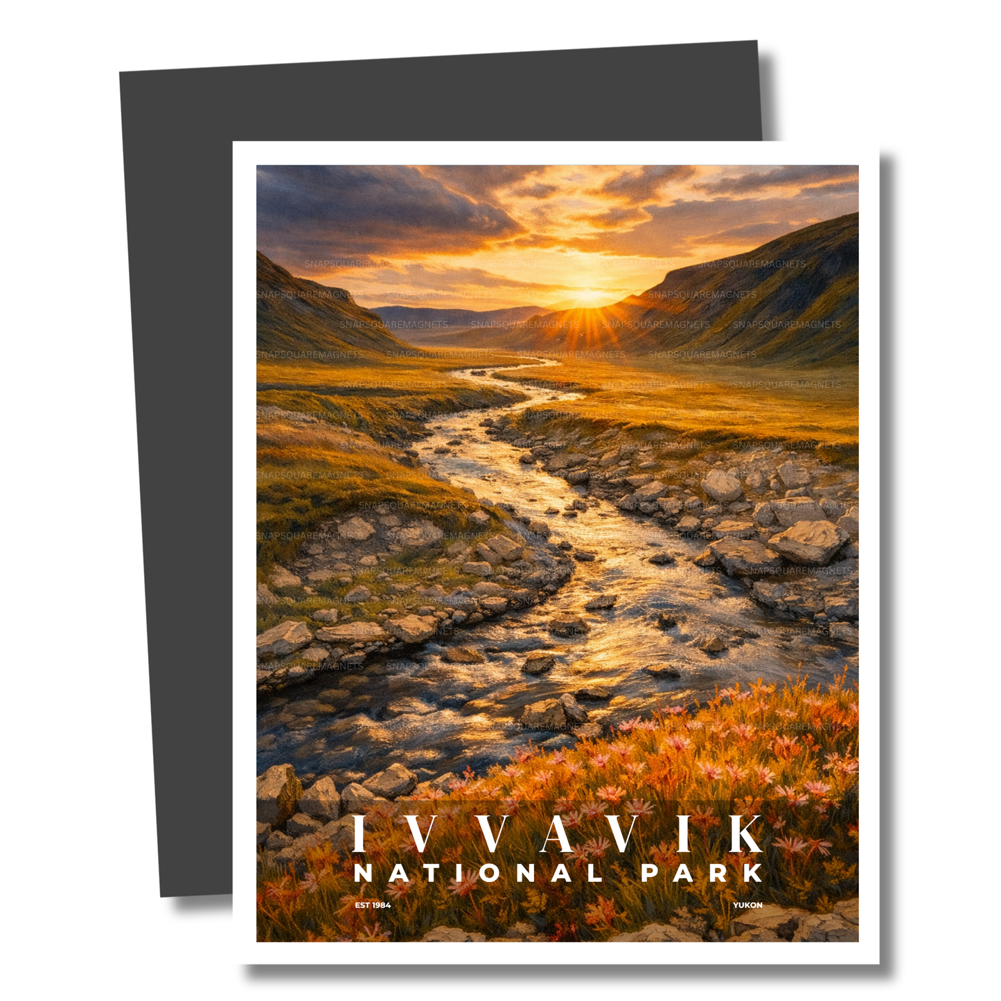 Magnet of Ivvavik National Park with a sunset over a stream and mountains.