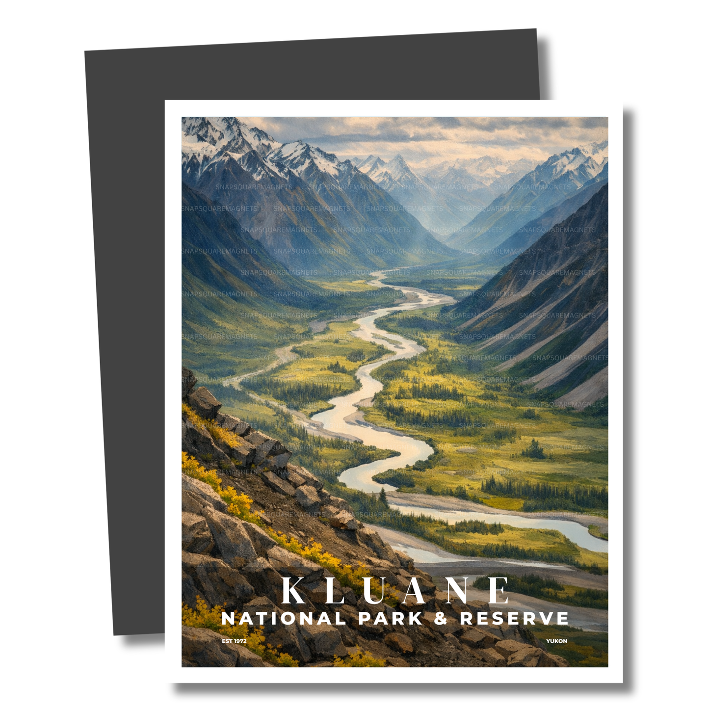 Magnet of Kluane National Park & Reserve with a river and mountains.