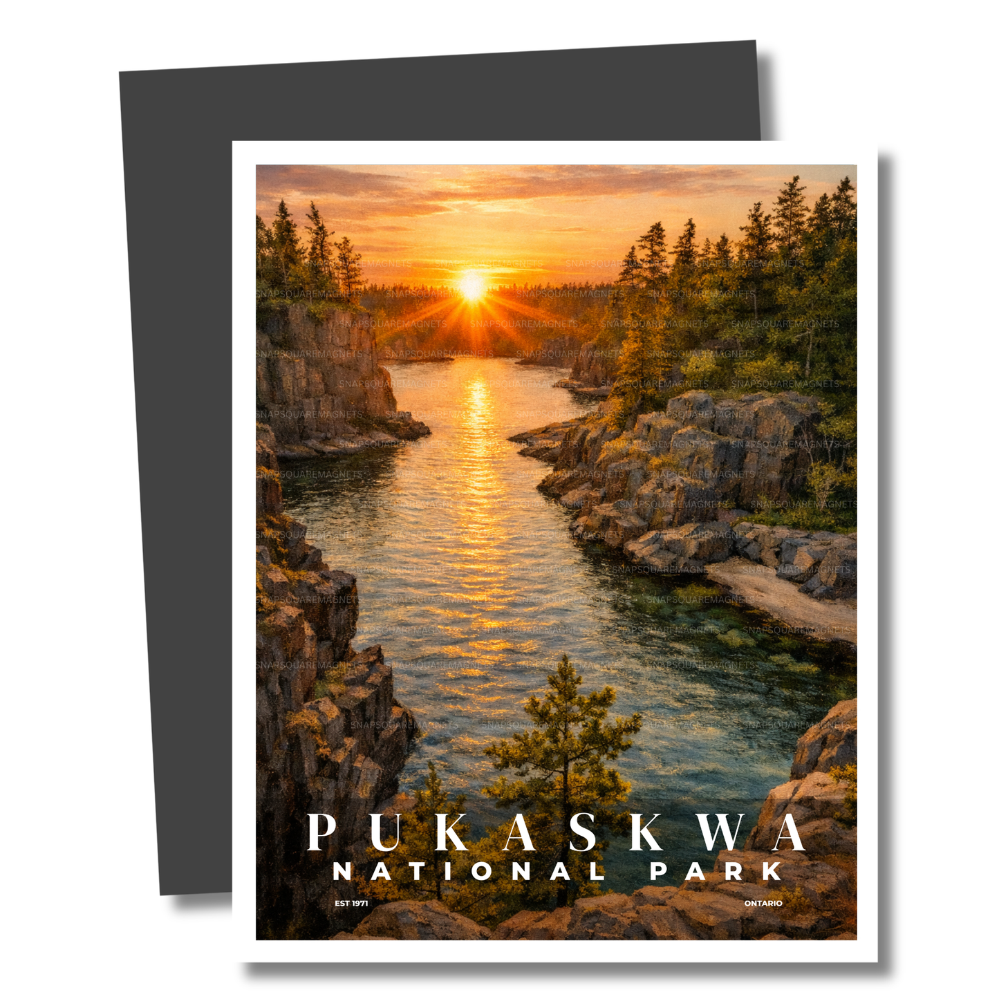 Magnet of Pukaskwa National Park with a sunset over water and cliffs.