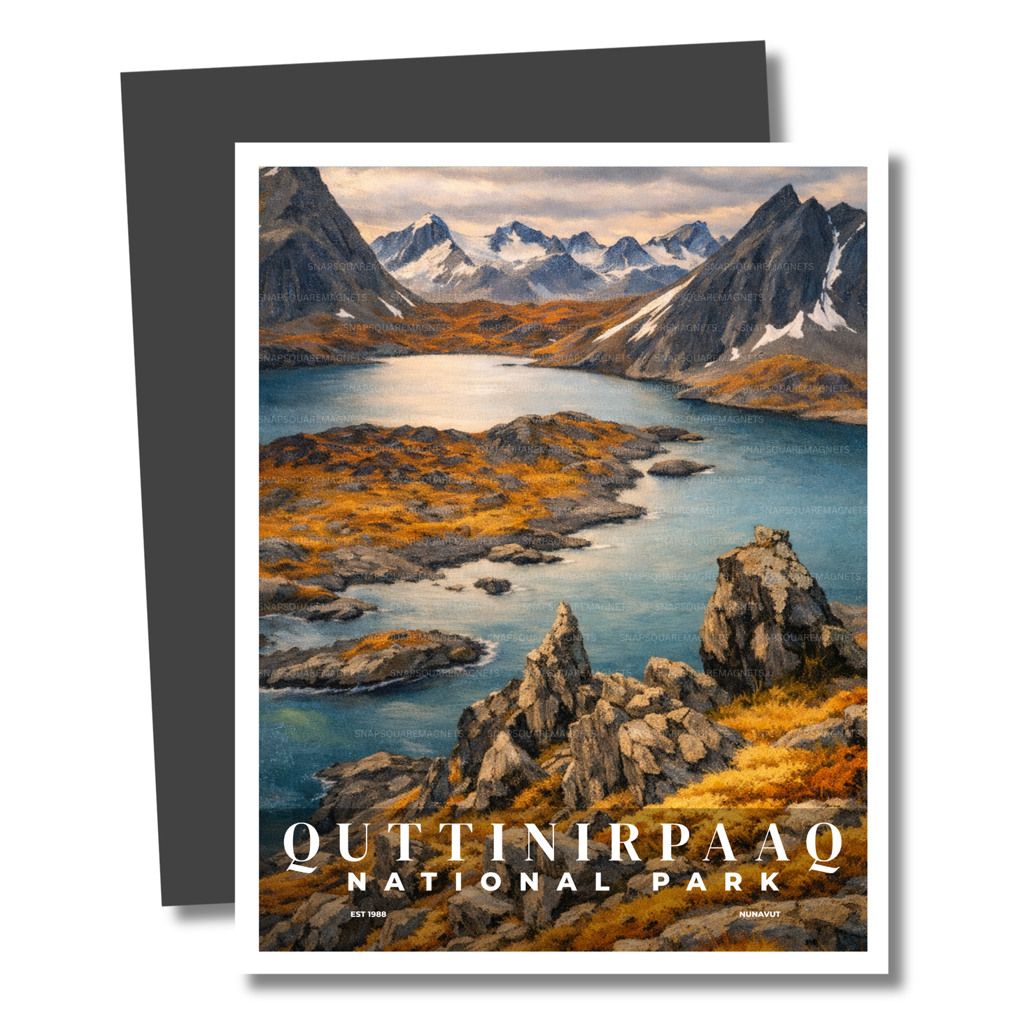 Magnet of Quttinirpaaq National Park with mountains and lake.