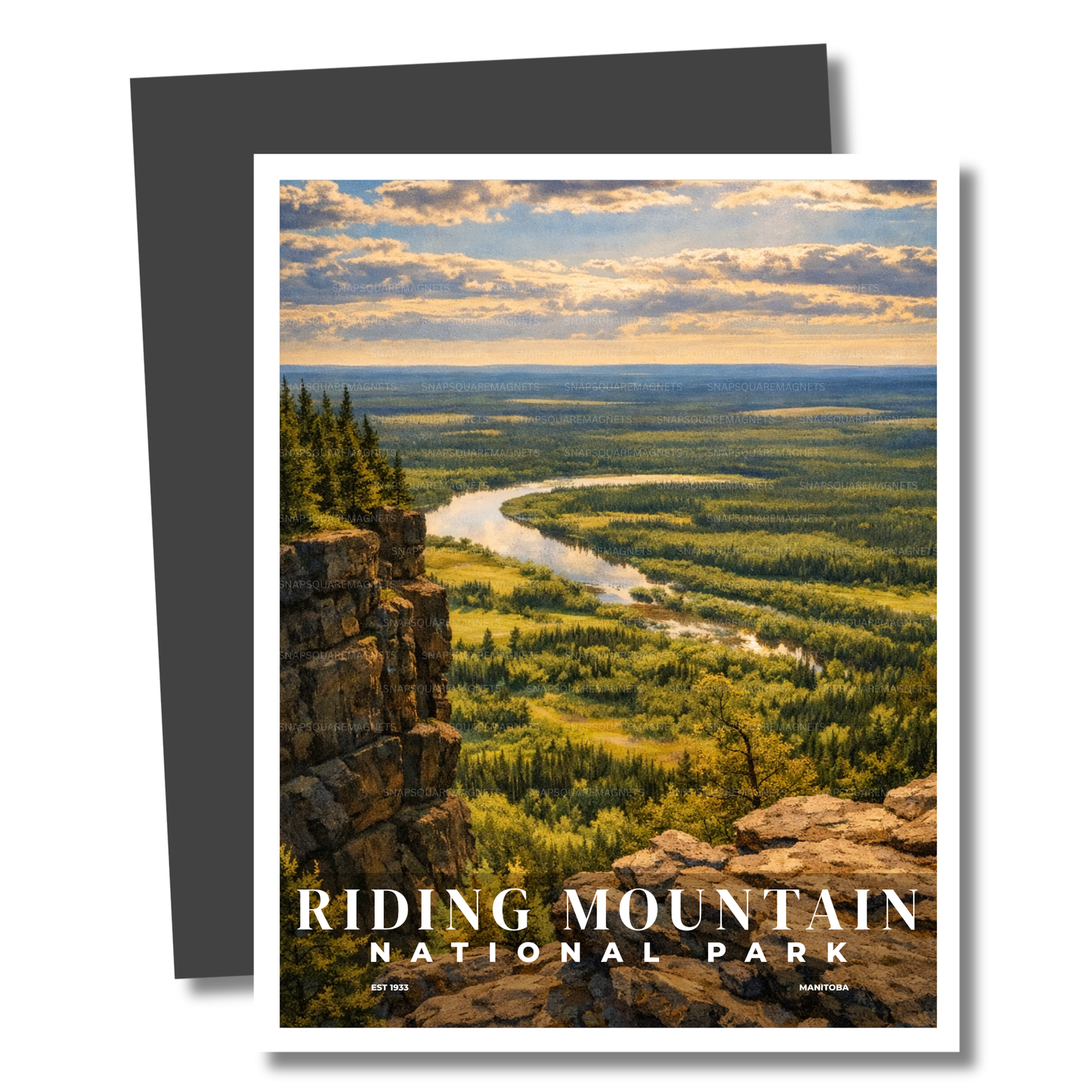 Magnet of Riding Mountain National Park with a scenic view of a river and landscape.